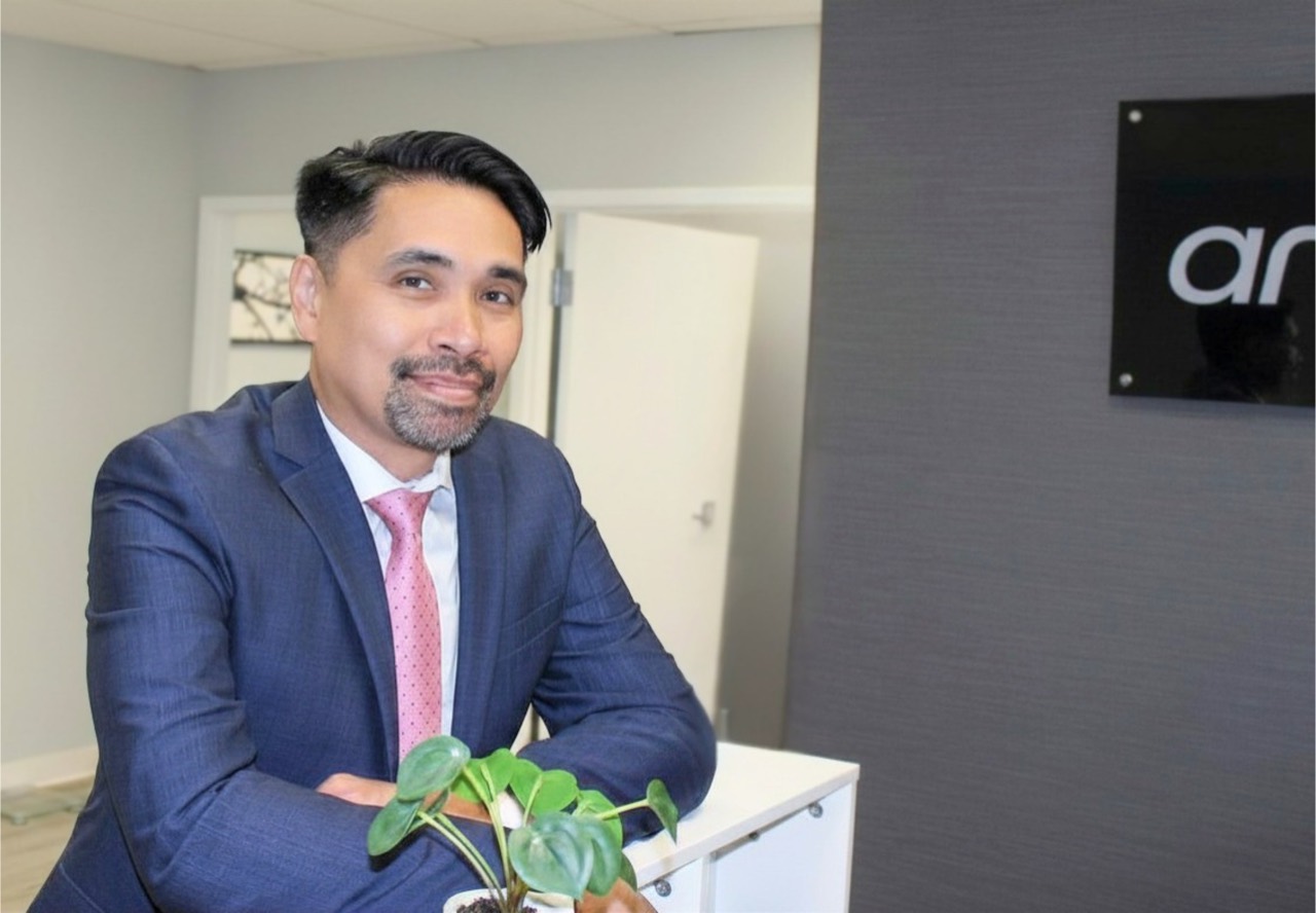 Dr. Antonio in the Aris office